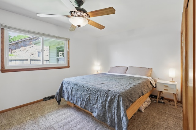 310 W Wishart Dr, Monett, MO 65708 - carpeted bedroom featuring baseboards and ceiling fan