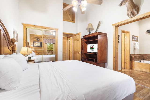 135 Rock Candy Ln, Branson, MO 65616 - bedroom featuring high vaulted ceiling and a ceiling fan