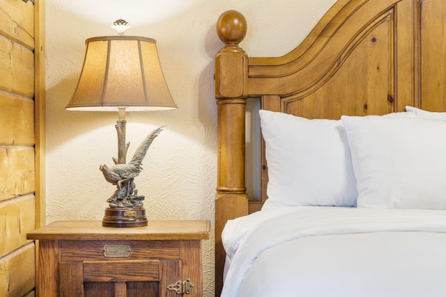 135 Rock Candy Ln, Branson, MO 65616 - bedroom featuring a textured wall