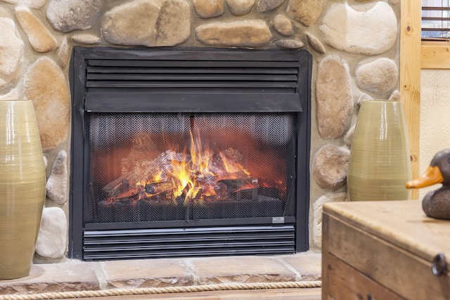 135 Rock Candy Ln, Branson, MO 65616 - room details featuring a stone fireplace