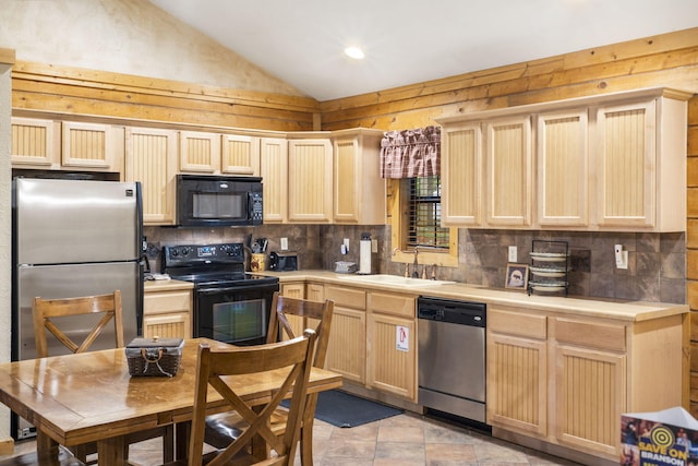135 Rock Candy Ln, Branson, MO 65616 - kitchen featuring a sink, black appliances, and light brown cabinets