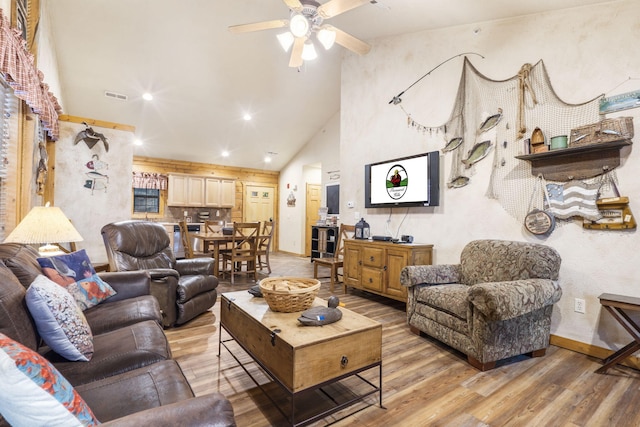 135 Rock Candy Ln, Branson, MO 65616 - living area featuring light wood-style floors, high vaulted ceiling, a ceiling fan, visible vents, and recessed lighting