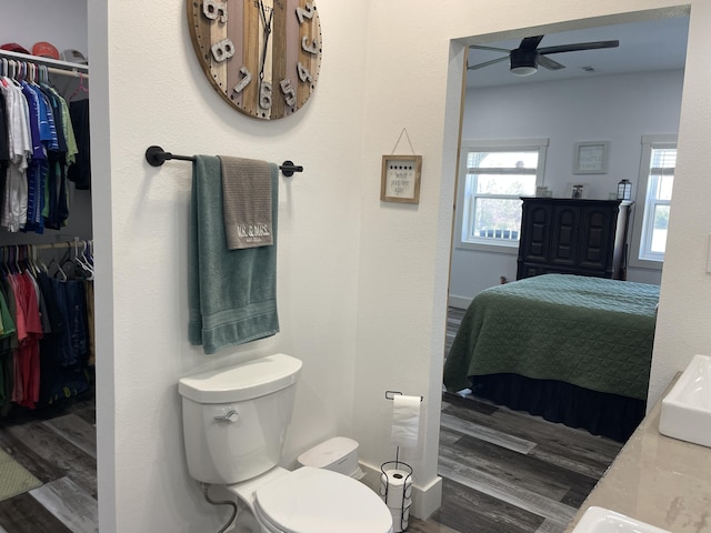 3826 S 77th Rd, Dunnegan, MO 65640 - ensuite bathroom with toilet, wood finished floors, ceiling fan, and ensuite bath