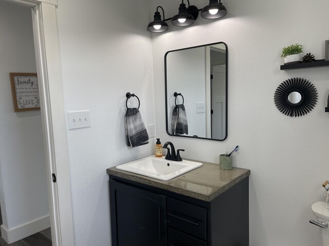 3826 S 77th Rd, Dunnegan, MO 65640 - half bath with toilet, vanity, and baseboards