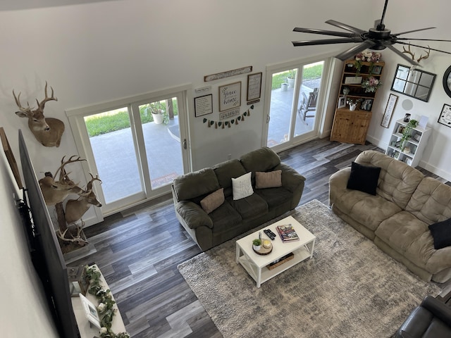 3826 S 77th Rd, Dunnegan, MO 65640 - living area featuring dark wood finished floors, baseboards, and ceiling fan