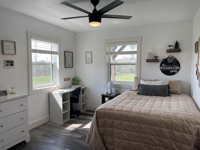 3826 S 77th Rd, Dunnegan, MO 65640 - bedroom featuring dark wood-type flooring, ceiling fan, and baseboards