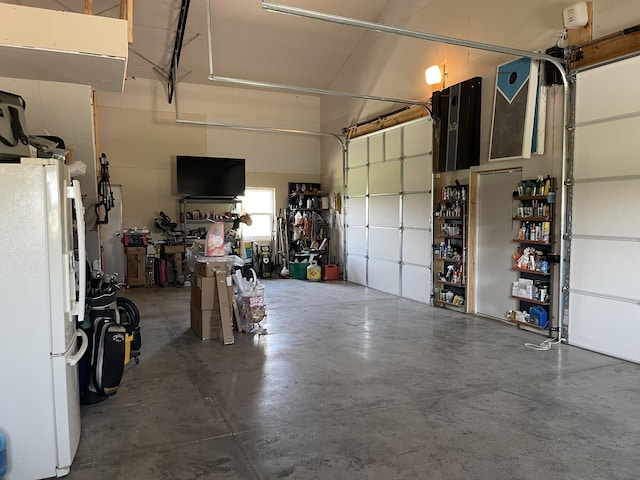 3826 S 77th Rd, Dunnegan, MO 65640 - garage with freestanding refrigerator