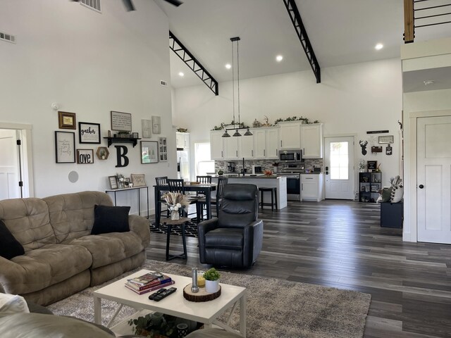 3826 S 77th Rd, Dunnegan, MO 65640 - living room featuring recessed lighting, dark wood-type flooring, a towering ceiling, and visible vents