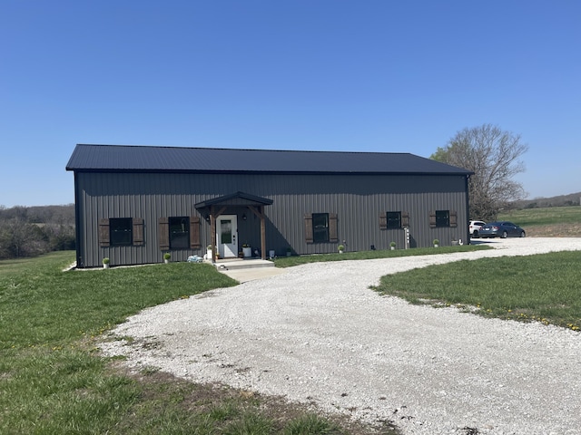 3826 S 77th Rd, Dunnegan, MO 65640 - view of pole building featuring driveway and a lawn