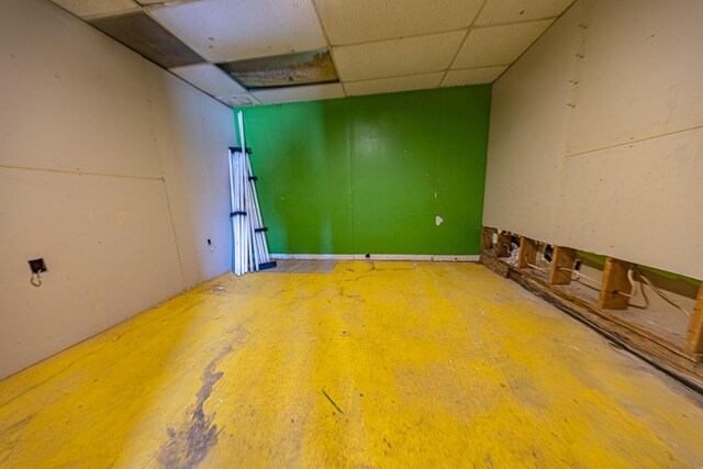 2834 US Highway 65, Urbana, MO 65767 - empty room with concrete floors and a drop ceiling