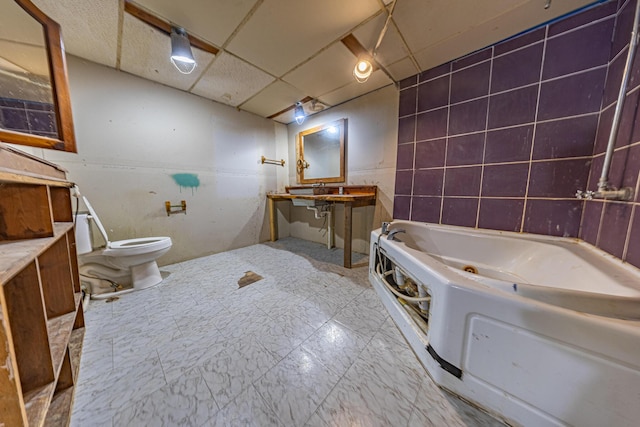 2834 US Highway 65, Urbana, MO 65767 - full bathroom with a drop ceiling, a tub with jets, and toilet