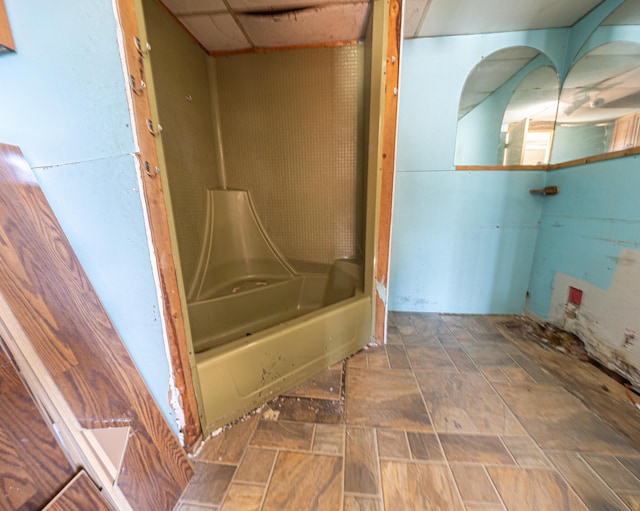2834 US Highway 65, Urbana, MO 65767 - bathroom featuring stone finish flooring and shower / bath combination