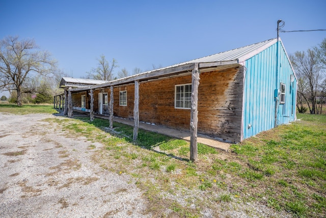 2834 US Highway 65, Urbana, MO 65767 - view of property exterior featuring metal roof and an outdoor structure