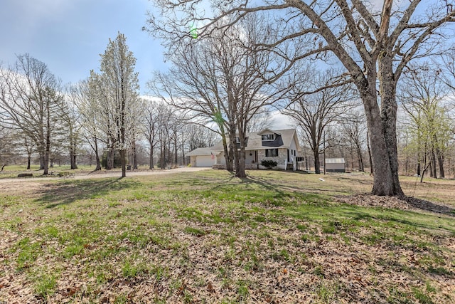 view of yard featuring a garage