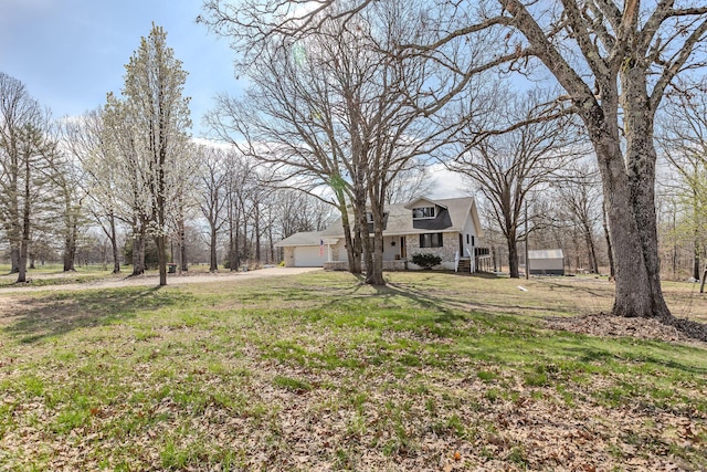 view of yard with an attached garage