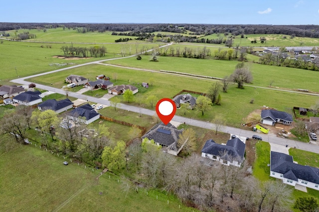 birds eye view of property featuring a residential view and a rural view