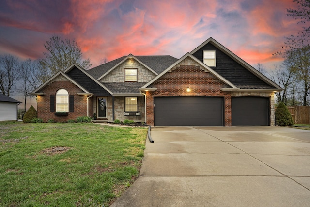 view of front of home with an attached garage, a lawn, concrete driveway, brick siding, and roof with shingles