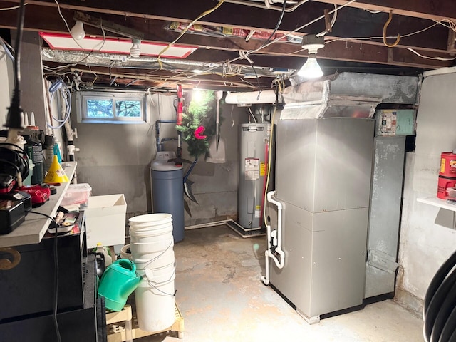 utility room featuring electric water heater