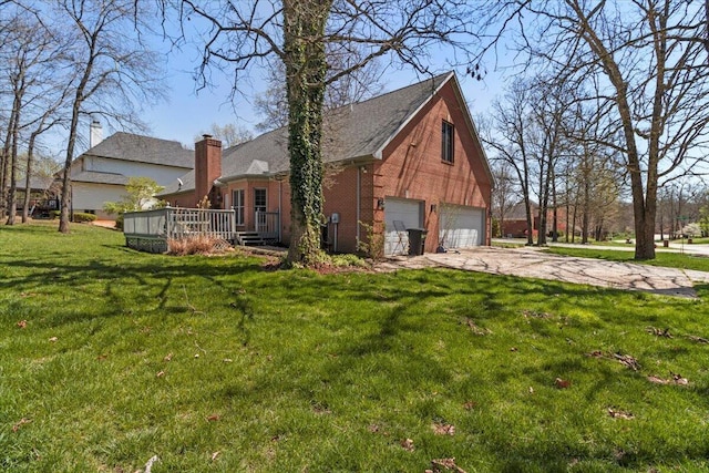 2111 Sycamore Dr, West Plains, MO 65775 - view of side of home featuring a yard, brick siding, a deck, and driveway