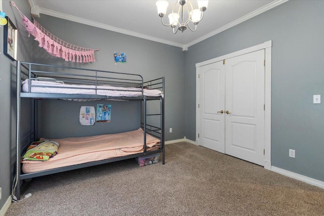 2111 Sycamore Dr, West Plains, MO 65775 - bedroom featuring a closet, baseboards, a chandelier, crown molding, and carpet floors