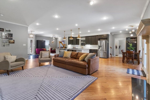 2111 Sycamore Dr, West Plains, MO 65775 - living area with recessed lighting, light wood-style floors, baseboards, and ornamental molding