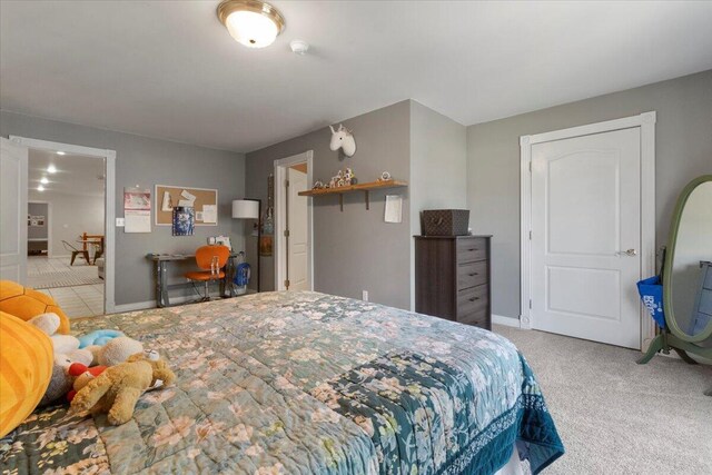 2111 Sycamore Dr, West Plains, MO 65775 - carpeted bedroom featuring baseboards