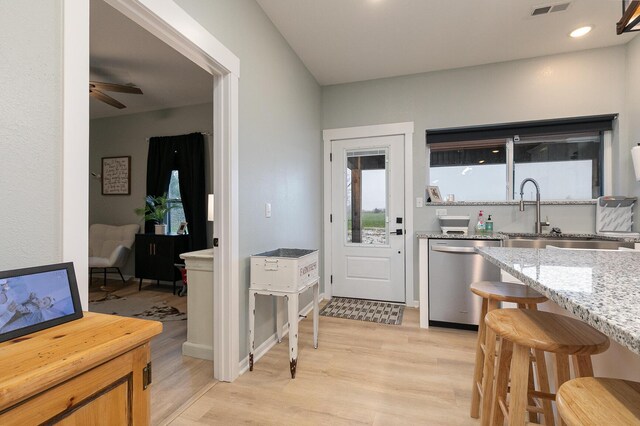 1798 E 328th Rd, Bolivar, MO 65613 - kitchen with a sink, visible vents, light wood-type flooring, and dishwasher