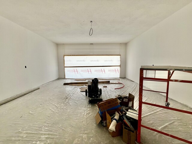 710 E Vivian St, Bolivar, MO 65613 - interior space with a textured ceiling