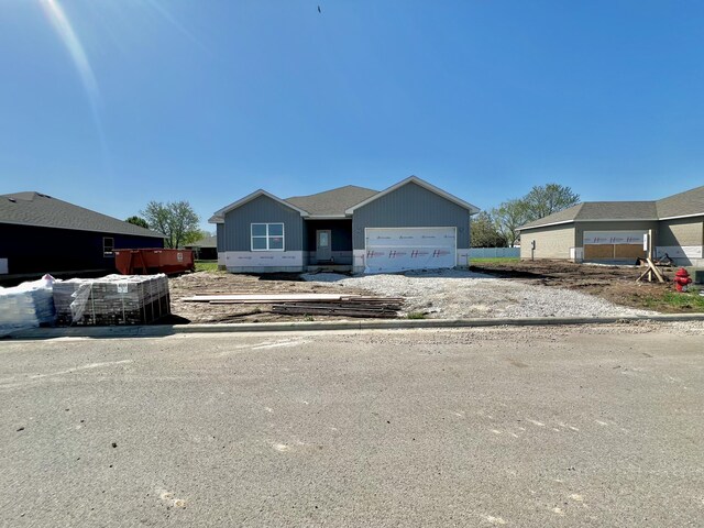 710 E Vivian St, Bolivar, MO 65613 - view of front of house with an attached garage
