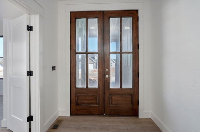 3021 W Allen Dr, Springfield, MO 65810 - entrance foyer featuring french doors and light wood-style flooring