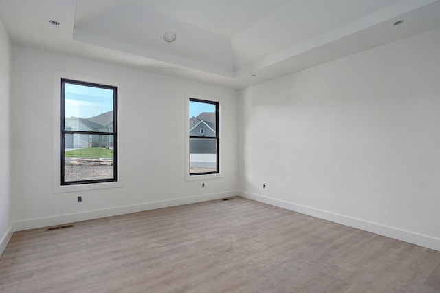 3021 W Allen Dr, Springfield, MO 65810 - empty room with light wood-type flooring and a tray ceiling