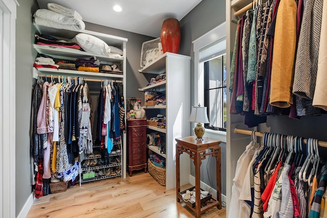 spacious closet featuring wood finished floors