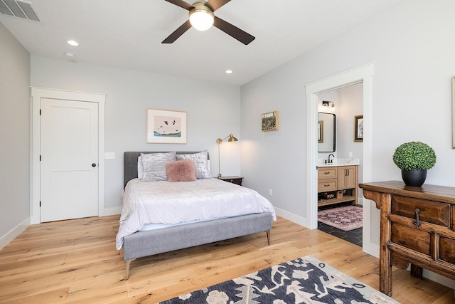 bedroom featuring recessed lighting, light wood-style flooring, baseboards, and visible vents