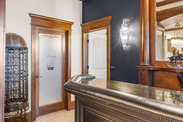 hallway featuring light tile patterned floors
