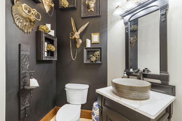 half bath with toilet and vanity