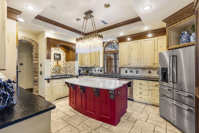 kitchen featuring a center island, recessed lighting, stone tile floors, and appliances with stainless steel finishes