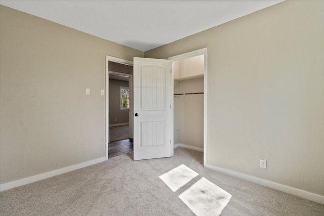 1945 Debra Dr, West Plains, MO 65775 - unfurnished bedroom featuring a closet, light colored carpet, and baseboards