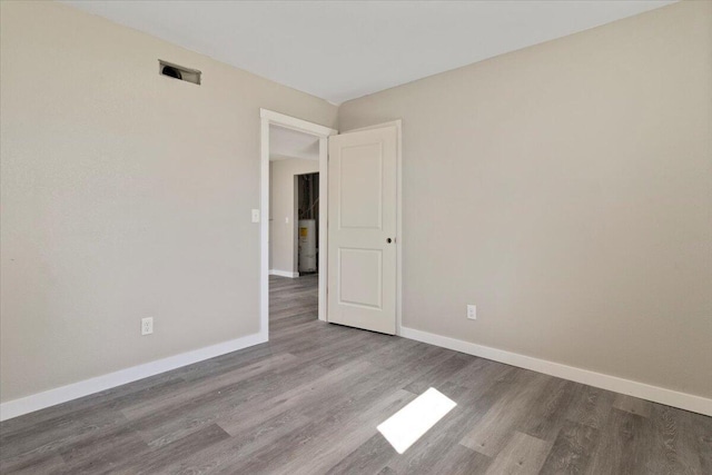 1945 Debra Dr, West Plains, MO 65775 - unfurnished room with baseboards and wood finished floors