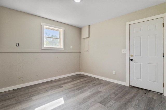 1945 Debra Dr, West Plains, MO 65775 - spare room featuring wood finished floors and baseboards