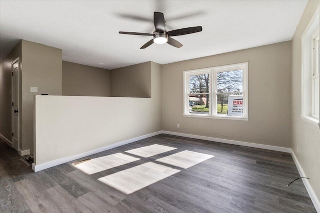 1945 Debra Dr, West Plains, MO 65775 - spare room with ceiling fan, baseboards, and wood finished floors
