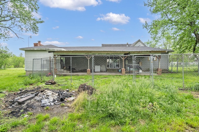 206 E 7th St, Miller, MO 65707 - back of house with fence