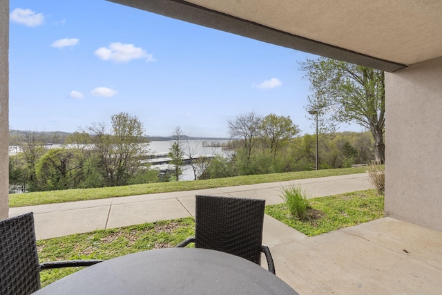 611 Rock Ln Unit 402, Branson, MO 65616 - view of patio / terrace featuring a water view