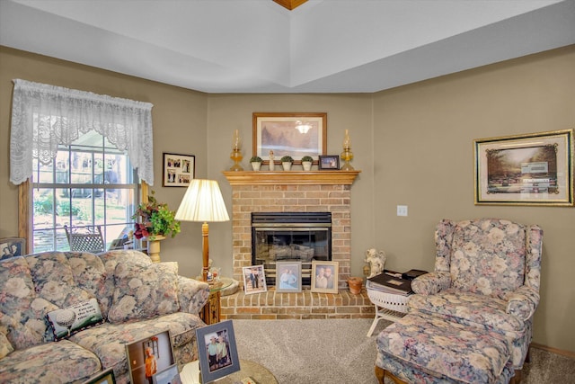 carpeted living room with a fireplace