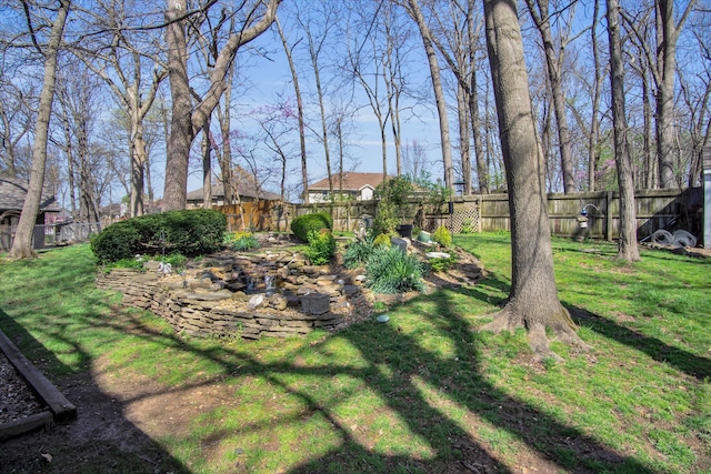view of yard featuring fence