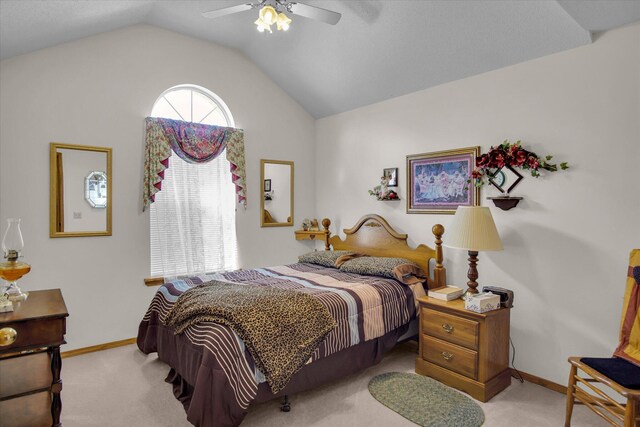 bedroom featuring baseboards, carpet flooring, ceiling fan, and lofted ceiling