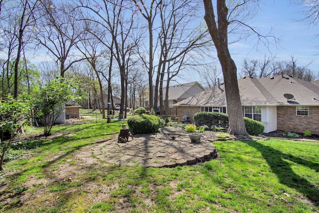 view of yard with a patio area
