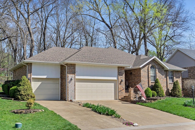 ranch-style house featuring a garage, a front lawn, brick siding, a shingled roof, and driveway