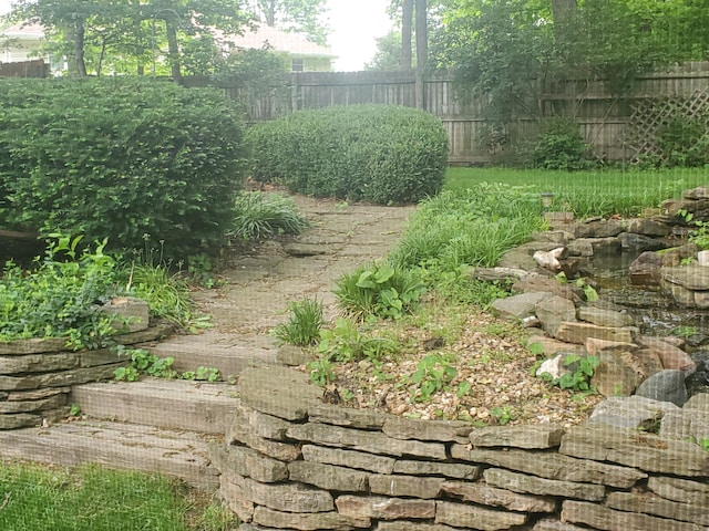 3899 W Woodland St, Springfield, MO 65807 - view of yard featuring fence