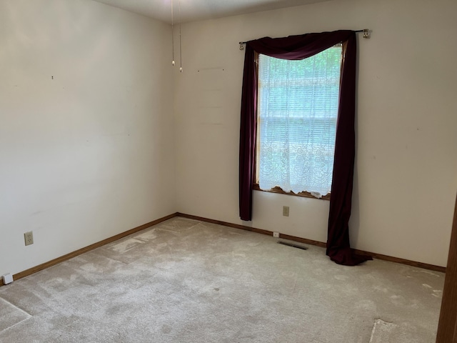 3899 W Woodland St, Springfield, MO 65807 - carpeted empty room featuring baseboards