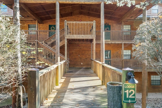 exterior space featuring log veneer siding